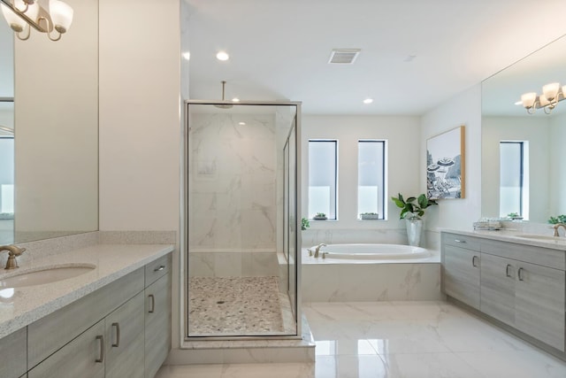 8451 Grand Prix Ln, Boynton Beach, FL 33472 - full bath with a notable chandelier, a bath, a sink, and a marble finish shower