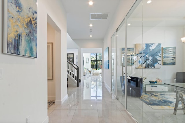 8451 Grand Prix Ln, Boynton Beach, FL 33472 - hallway with baseboards, visible vents, stairway, and recessed lighting