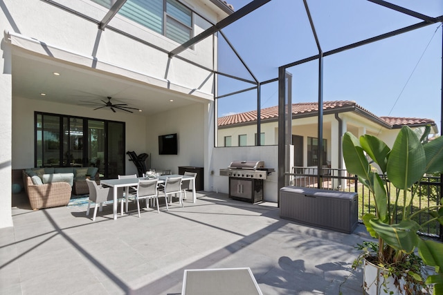 8451 Grand Prix Ln, Boynton Beach, FL 33472 - view of patio / terrace with glass enclosure, area for grilling, outdoor lounge area, outdoor dining space, and ceiling fan