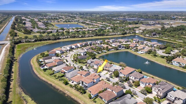 8451 Grand Prix Ln, Boynton Beach, FL 33472 - birds eye view of property with a water view and a residential view