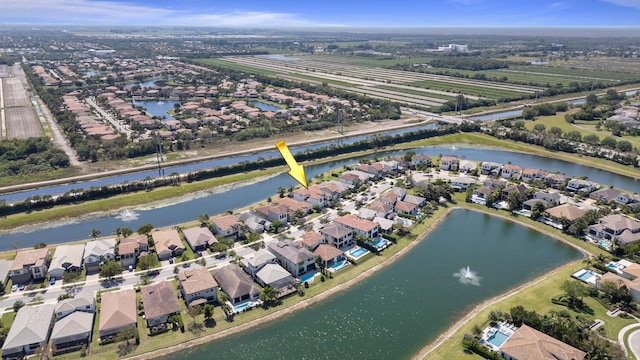 8451 Grand Prix Ln, Boynton Beach, FL 33472 - drone / aerial view with a residential view and a water view