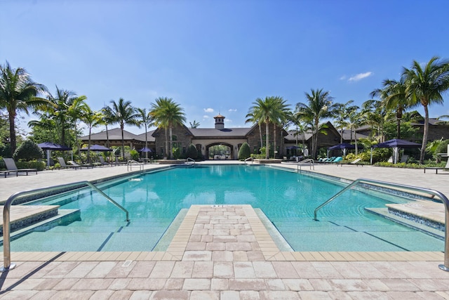 8451 Grand Prix Ln, Boynton Beach, FL 33472 - community pool with a patio