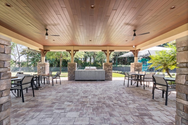 8451 Grand Prix Ln, Boynton Beach, FL 33472 - view of patio / terrace featuring ceiling fan, outdoor dining area, and fence