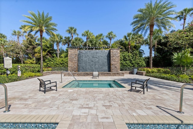 8451 Grand Prix Ln, Boynton Beach, FL 33472 - view of swimming pool with a patio