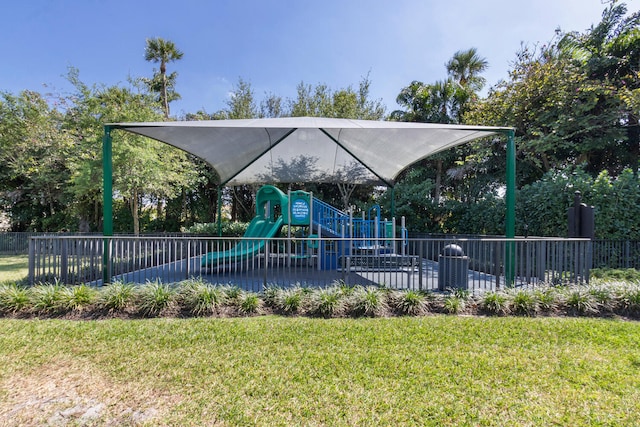 8451 Grand Prix Ln, Boynton Beach, FL 33472 - community play area with fence and a yard