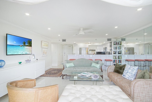 living area with ornamental molding, ceiling fan, recessed lighting, and visible vents