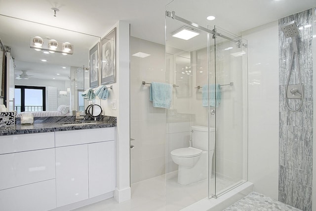 bathroom featuring a shower stall, ensuite bathroom, vanity, and toilet