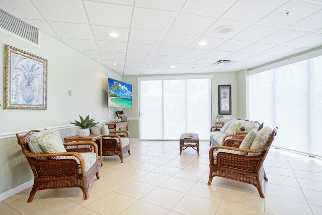 sitting room featuring light tile patterned floors, visible vents, and recessed lighting
