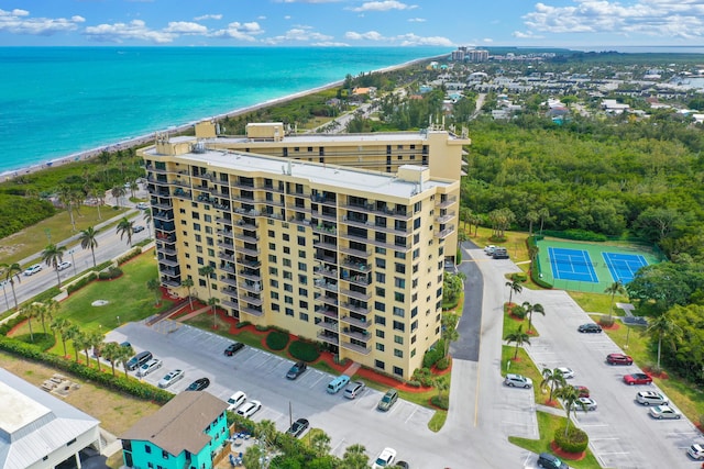 aerial view featuring a beach view and a water view