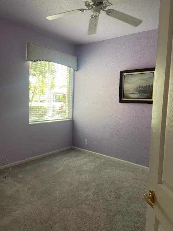 8047 Brindisi Ln, Boynton Beach, FL 33472 - carpeted empty room with ceiling fan and baseboards