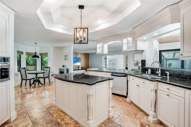 420 SW 128th Ave, Miami, FL 33184 - kitchen with a tray ceiling, a sink, pendant lighting, white cabinetry, and stainless steel appliances