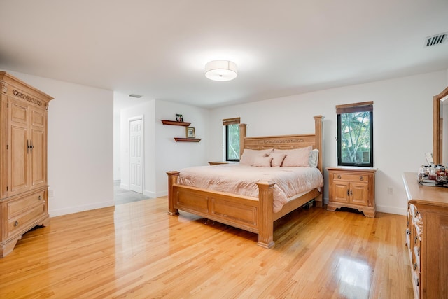 420 SW 128th Ave, Miami, FL 33184 - bedroom with baseboards, visible vents, and light wood-style floors