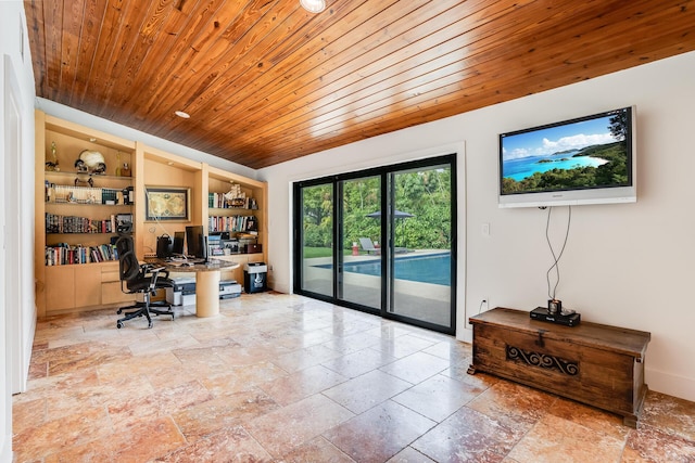420 SW 128th Ave, Miami, FL 33184 - home office featuring vaulted ceiling, wooden ceiling, baseboards, built in shelves, and stone tile flooring