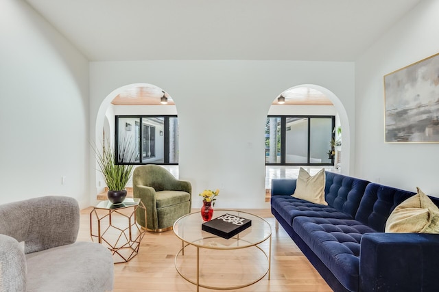 420 SW 128th Ave, Miami, FL 33184 - living room with arched walkways and wood finished floors