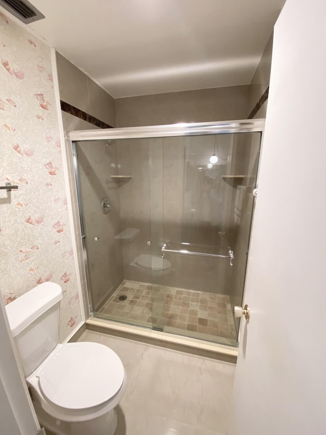 2721 SW 15th St Unit 202, Delray Beach, FL 33445 - full bathroom featuring a stall shower, wallpapered walls, and marble finish floors