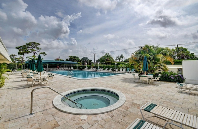2721 SW 15th St Unit 202, Delray Beach, FL 33445 - community pool featuring a patio and a community hot tub