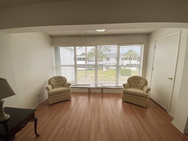 2721 SW 15th St Unit 202, Delray Beach, FL 33445 - living area featuring wood finished floors