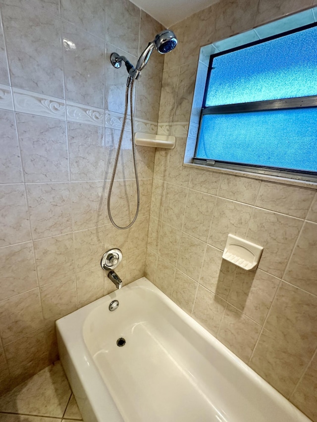full bath with tile patterned floors and tub / shower combination