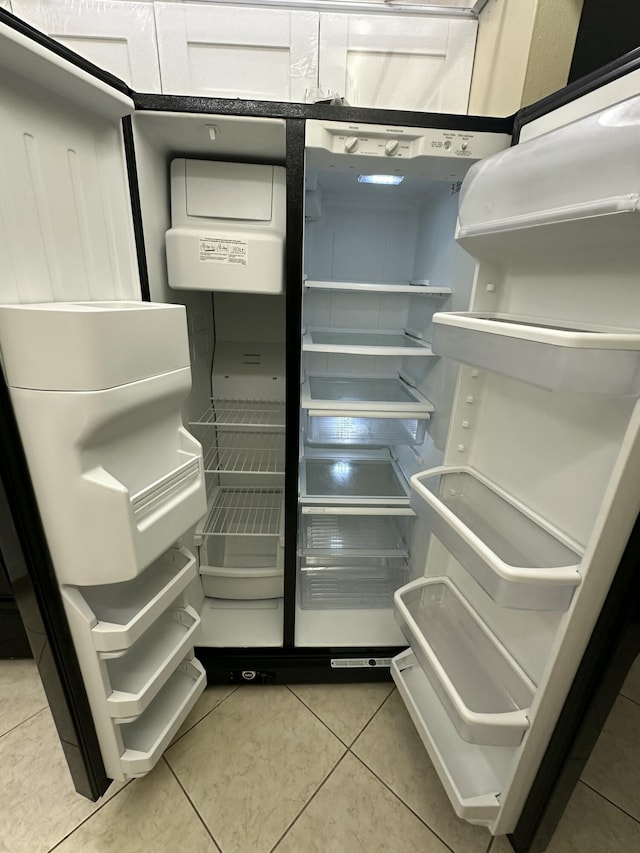 details with refrigerator with glass door