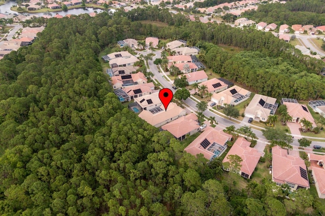 aerial view with a residential view and a forest view