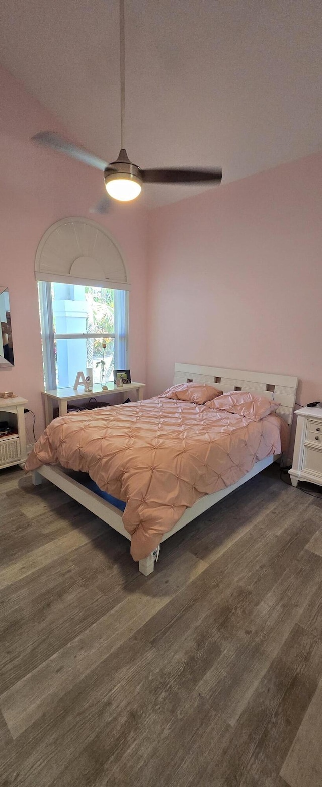 2285 Saratoga Ln, West Palm Beach, FL 33409 - bedroom with a textured ceiling, a ceiling fan, and dark wood finished floors