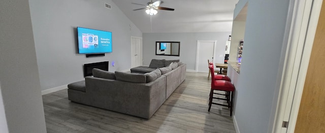 2285 Saratoga Ln, West Palm Beach, FL 33409 - living room with visible vents, wood finished floors, and ceiling fan