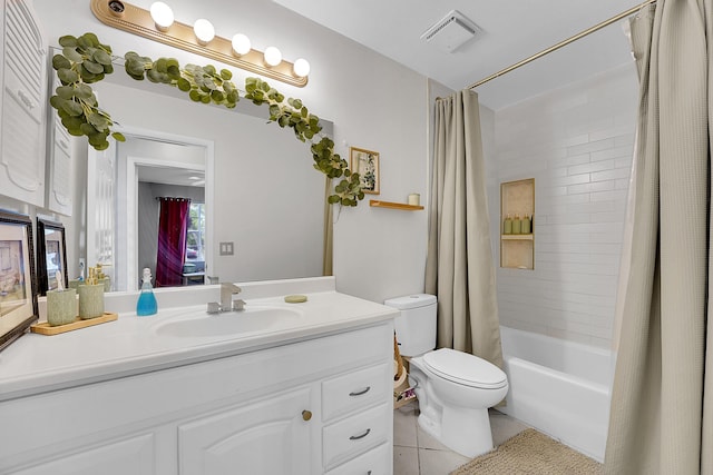 bathroom with shower / bath combination with curtain, toilet, vanity, and visible vents