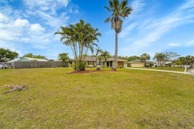 view of yard featuring fence