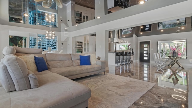 1526 SE 11th St, Deerfield Beach, FL 33441 - living room with a towering ceiling, marble finish floor, and an inviting chandelier
