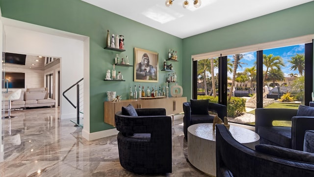 1526 SE 11th St, Deerfield Beach, FL 33441 - interior space with baseboards, a bar, and marble finish floor
