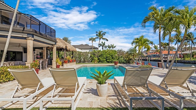 1526 SE 11th St, Deerfield Beach, FL 33441 - outdoor pool with ceiling fan, a water view, and a patio