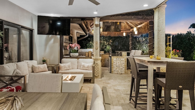1526 SE 11th St, Deerfield Beach, FL 33441 - view of patio with outdoor dining space, an outdoor living space with a fire pit, an outdoor kitchen, and a ceiling fan