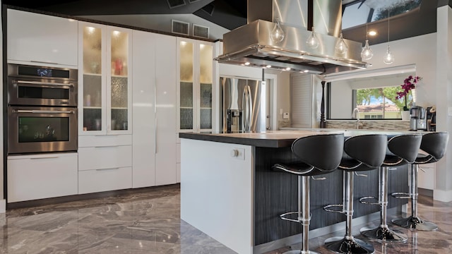 1526 SE 11th St, Deerfield Beach, FL 33441 - kitchen with white cabinets, modern cabinets, appliances with stainless steel finishes, and island exhaust hood