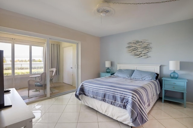 95 N N Blvd Unit 2B, Boynton Beach, FL 33435 - bedroom with light tile patterned flooring, access to exterior, and ceiling fan