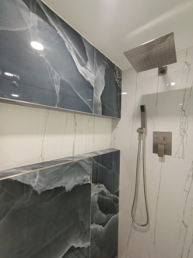 7240 Huntington Ln Unit 408, Delray Beach, FL 33446 - bathroom view of a marble finish shower