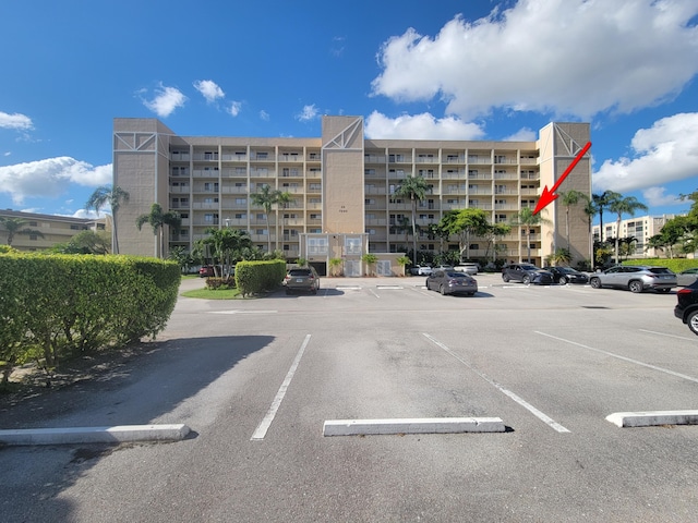 7240 Huntington Ln Unit 408, Delray Beach, FL 33446 - view of apartment building / complex with uncovered parking