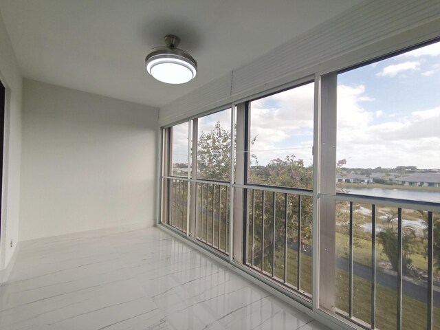 7240 Huntington Ln Unit 408, Delray Beach, FL 33446 - unfurnished sunroom with a water view