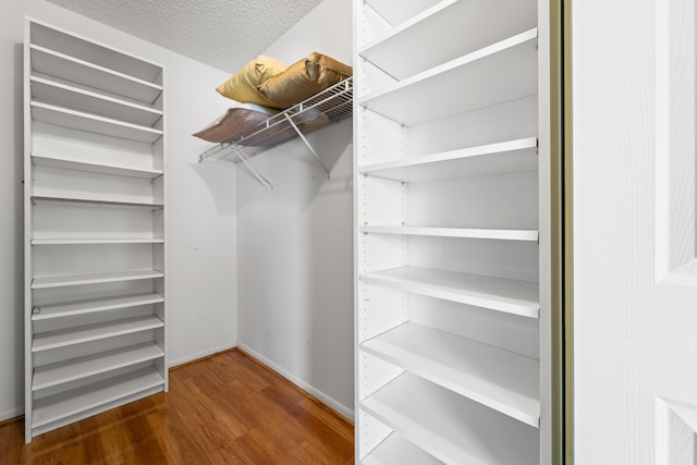 14112 Huntington Pointe Dr Unit 105, Delray Beach, FL 33484 - spacious closet with wood finished floors