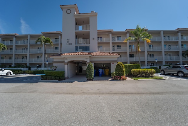 14112 Huntington Pointe Dr Unit 105, Delray Beach, FL 33484 - view of property with uncovered parking