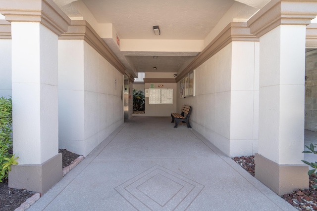 14112 Huntington Pointe Dr Unit 105, Delray Beach, FL 33484 - property entrance with stucco siding