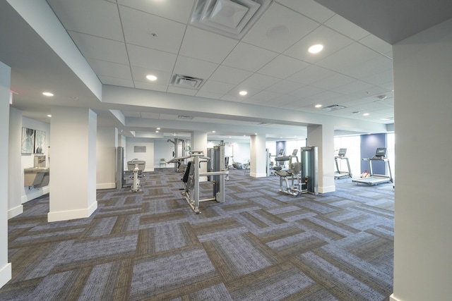 14112 Huntington Pointe Dr Unit 105, Delray Beach, FL 33484 - exercise room featuring recessed lighting, baseboards, visible vents, and dark carpet