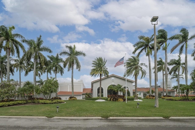 14112 Huntington Pointe Dr Unit 105, Delray Beach, FL 33484 - mediterranean / spanish home featuring a front lawn