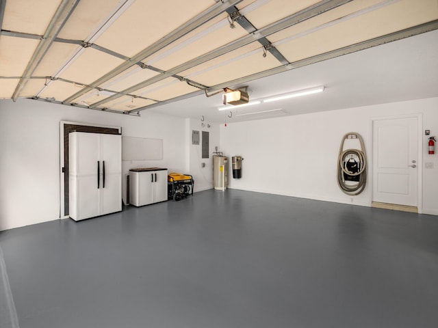 garage with electric panel, gas water heater, a garage door opener, and fridge