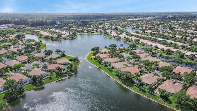 bird's eye view with a water view and a residential view