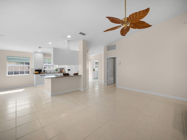 unfurnished living room featuring light tile patterned flooring, visible vents, ceiling fan, and recessed lighting