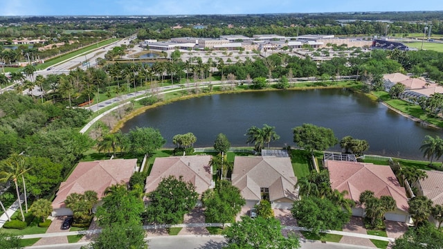 aerial view with a residential view and a water view