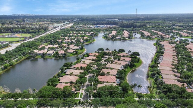 aerial view featuring a residential view and a water view