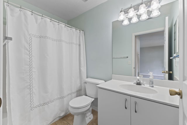 full bath featuring a shower with curtain, toilet, vanity, and tile patterned flooring