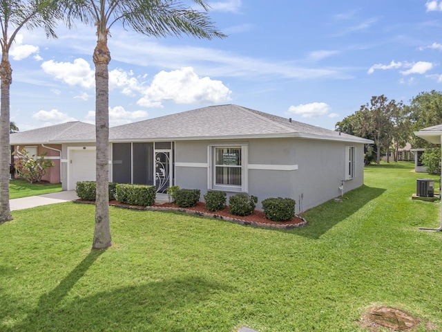 ranch-style house featuring stucco siding, a front yard, central AC, a garage, and a shingled roof