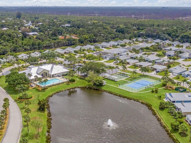 bird's eye view with a residential view and a water view